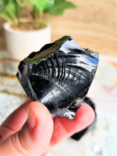 Load image into Gallery viewer, Black Obsidian is a gentle, grounding crystal that protects against negativity and unwelcome energy