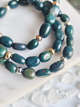 Load image into Gallery viewer, Explore Bloodstone's transformative properties—a powerful ally for mental and physical well-being. Stay strong, move forward, and prioritize self-care with its grounding energies