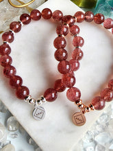 Load image into Gallery viewer, Fuel your drive with Red Aventurine—a vibrant gem igniting creativity and motivation. Enhancing well-being, it propels you forward with determination and positivity. Elevate your journey to success with this remarkable stone