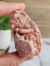 Load image into Gallery viewer, Embrace Rhodochrosite’s soothing energy to inspire compassion, harmony, and a deeper connection with your higher self