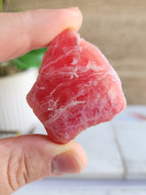 Load image into Gallery viewer, Discover the transformative power of Rhodochrosite, a crystal of unconditional love and deep emotional healing. Perfect for meditation and spiritual growth, it fosters self-acceptance, compassion, and inner balance