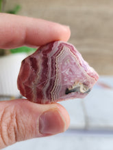 Load image into Gallery viewer, Rhodochrosite nurtures self-love, emotional healing, and spiritual growth, making it perfect for meditation and daily balance.