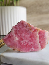 Load image into Gallery viewer, Embrace Rhodochrosite’s soothing energy to inspire compassion, harmony, and a deeper connection with your higher self
