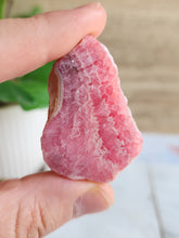 Load image into Gallery viewer, Embrace Rhodochrosite’s soothing energy to inspire compassion, harmony, and a deeper connection with your higher self