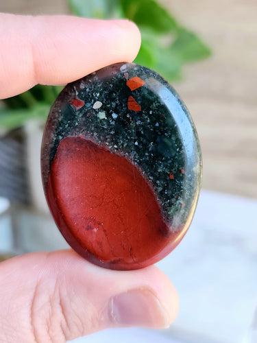 African Bloodstone embodies both spiritual power and physical strength, with its vibrant green hue representing vitality and passion. This sacred stone enhances intuition and fosters spiritual growth while supporting physical healing and resilience