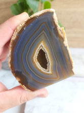 Load image into Gallery viewer, Experience agate&#39;s tranquil energy. This revered stone balances yin and yang, fostering inner peace and spiritual growth. Let its unique beauty guide your journey to enlightenment
