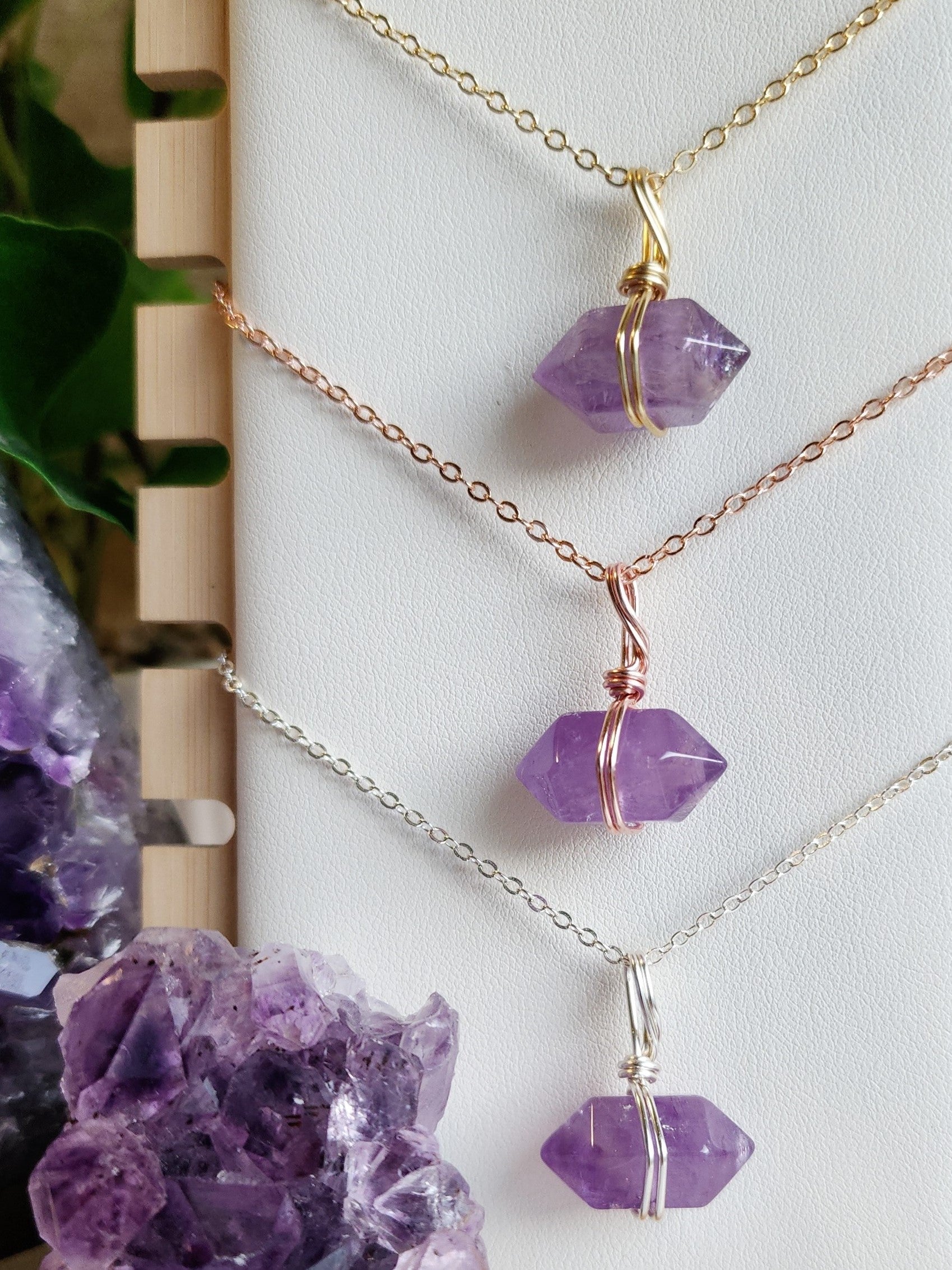 Handcrafted Amethyst crystal necklace by Anay Crystals, featuring two polished gemstone in a minimalist wire-wrapped setting designed for everyday wear.