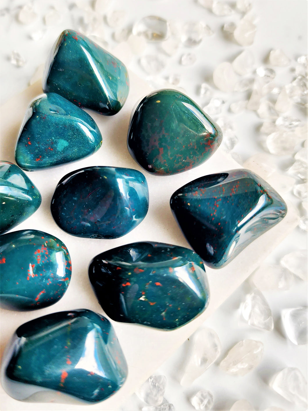  2 / 2  Bloodstone is believed to possess powerful spiritual properties, promoting courage, strength, and vitality while also enhancing one's connection to the earth.