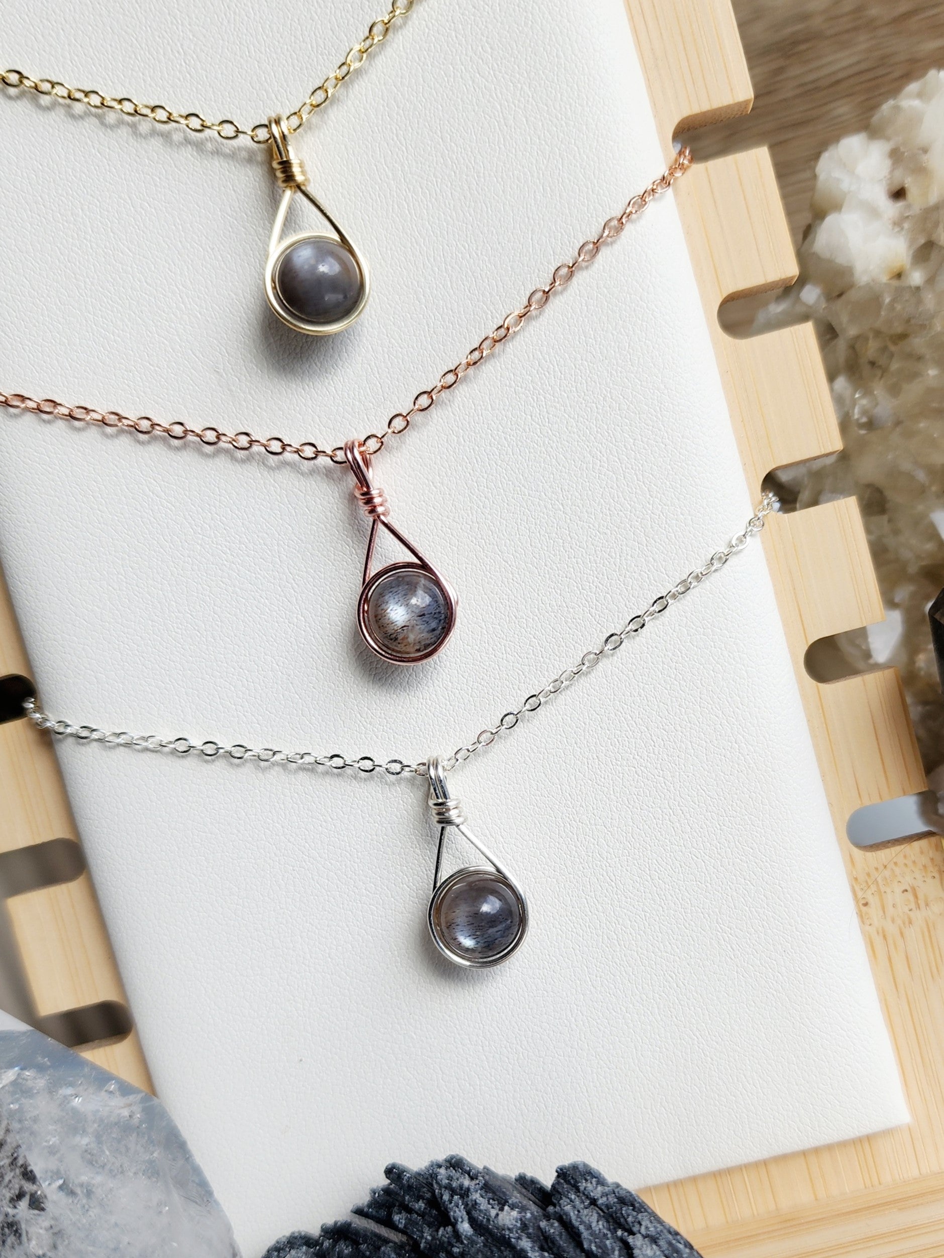 Handcrafted Delica crystal necklace by Anay Crystals, featuring a polished gemstone in a minimalist wire-wrapped setting designed for everyday wear.