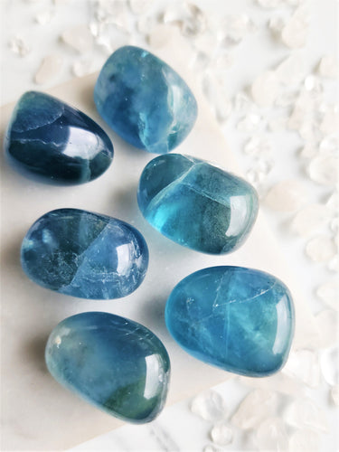 Blue fluorite is believed to enhance intuition and understanding. Its calming energy promotes a deeper connection to higher realms, aiding meditation and facilitating spiritual growth.