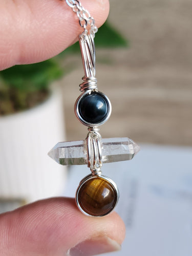 Crystal necklace for protection and strength with Blue & Gold Tiger’s Eye and Quartz. Supports confidence, grounding, and energetic shielding