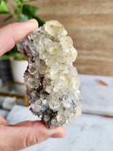 Load image into Gallery viewer, Calcite on Smokey Quartz with Fluorite
