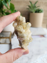 Load image into Gallery viewer, Yellow and Black Calcite harmonizes light and stability, clearing negativity and releasing emotional blockages. It empowers transformation and manifestation with clarity
