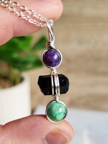 Step into your power with Charoite, Black Tourmaline, and Variscite. Crafted for protection, transformation, and the courage to take bold steps forward