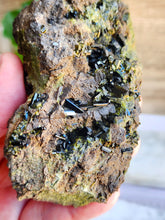 Load image into Gallery viewer, Meet Epidote: a striking green mineral renowned for its spiritual essence. Embrace its gentle yet potent vibrations to enhance personal growth and deepen your spiritual journey
