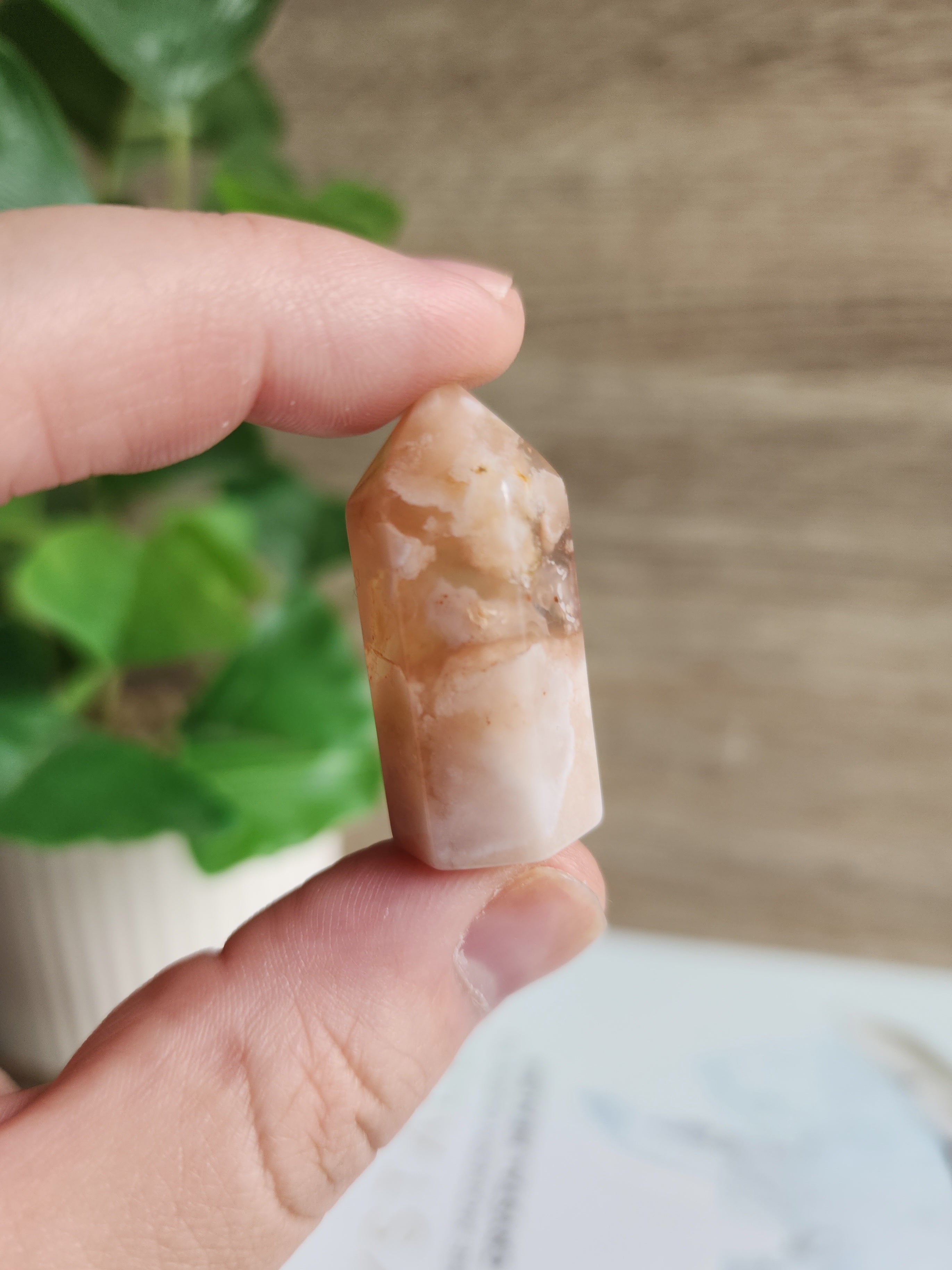 Polished Flower Agate mini crystal point featuring natural blossom-like inclusions in soft pink and cream tones.