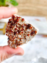Load image into Gallery viewer, Spessartine garnet is thought to boost creativity, passion, and courage, while cleansing negative energies and enhancing spiritual connection
