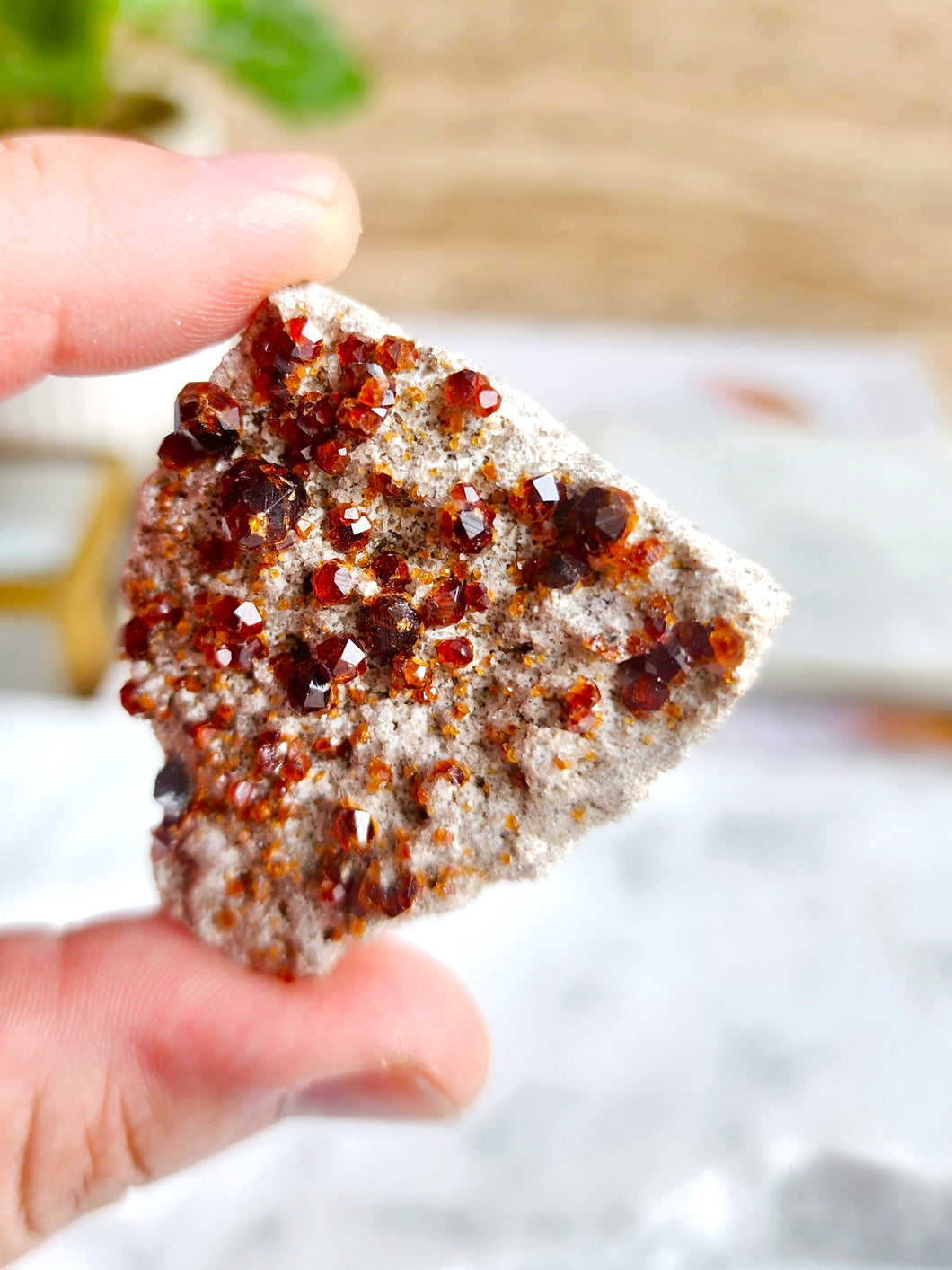 Spessartine garnet is thought to boost creativity, passion, and courage, while cleansing negative energies and enhancing spiritual connection