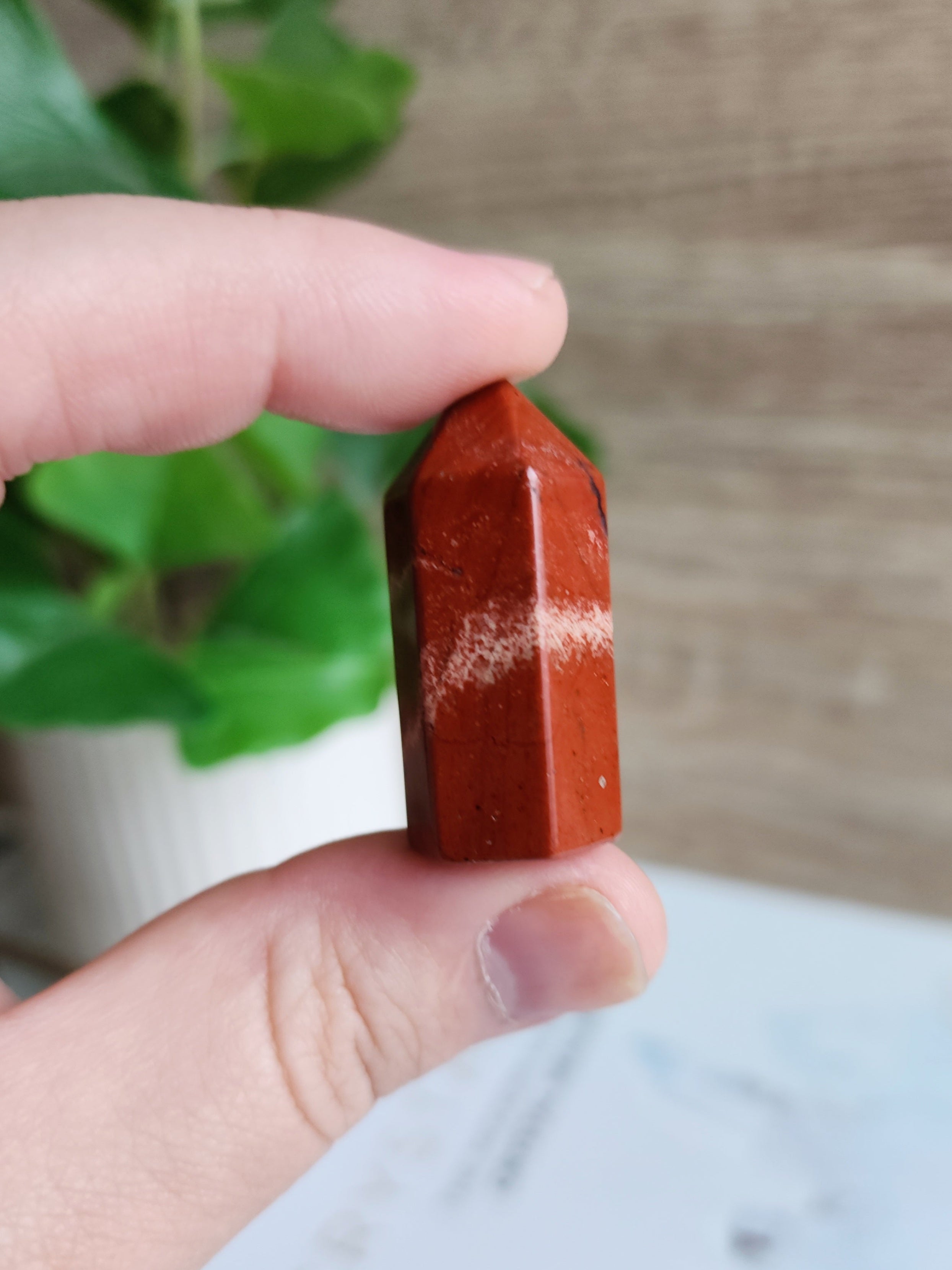 Polished Red Jasper mini crystal point featuring rich natural red colouring and a pointed termination.