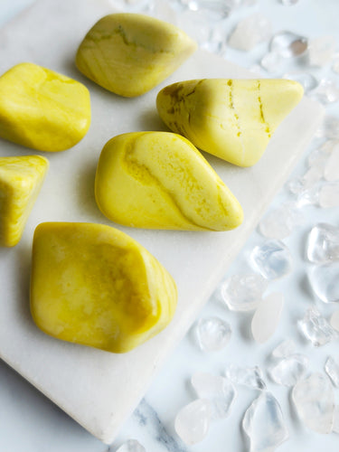 Lemon Serpentine, a vibrant gemstone, helps control emotions and actions while promoting positivity and spiritual growth. Its sunny, lemony hues uplift the spirit and enhance clarity, making it a perfect companion for your spiritual journey