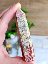Load image into Gallery viewer,  Discover Leopard Skin Jasper, a stone rooted in Earth&#39;s energy, igniting sensuality and confidence. Its captivating patterns promote stability and inner strength, deepening your connection to nature. Embrace its transformative power, radiating assurance as you navigate life&#39;s journey
