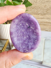Load image into Gallery viewer, Discover the transformative and calming qualities of Lepidolite, the &quot;stone of transition.&quot; Believed to guide through life changes and alleviate anxiety, this crystal radiates a gentle energy that promotes both spiritual enlightenment and inner peace
