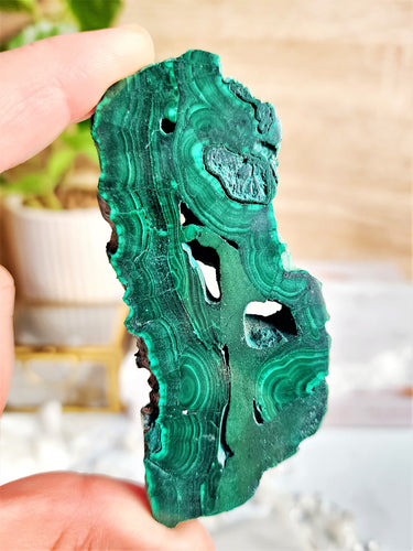 Malachite is believed to possess strong spiritual properties that aid in transformation, protection, and promoting emotional healing and balance.