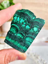 Load image into Gallery viewer, Malachite is believed to possess strong spiritual properties that are associated with protection, transformation, and its ability to aid in emotional healing and spiritual growth
