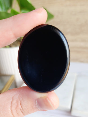 Black Obsidian, a stone of purification and protection, provides grounding and security by clearing negative energies and fostering energetic balance. Its transformative properties create a harmonious environment, ensuring both physical and metaphysical well-being