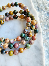 Load image into Gallery viewer, Ocean Jasper crystal symbolizing a gentle reminder to breathe, find balance, and release stress with its soothing energy
