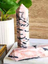 Load image into Gallery viewer, Pink Zebra Stone embodies a gentle yet potent energy, fostering inner peace, self-love, and spiritual growth. This exquisite gemstone balances emotions and connects you with universal energies of love and joy, making it a beautiful companion for your journey
