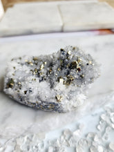 Load image into Gallery viewer, With pyrite&#39;s energy for prosperity and quartz&#39;s amplifying qualities, this pairing promotes balance and healing. Together, they ground your spirit and elevate your mindset
