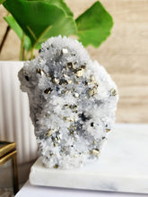 Load image into Gallery viewer, Pyrite and quartz grown together create a potent combination, attracting abundance and enhancing mental clarity. This powerful duo fosters creativity and personal transformation
