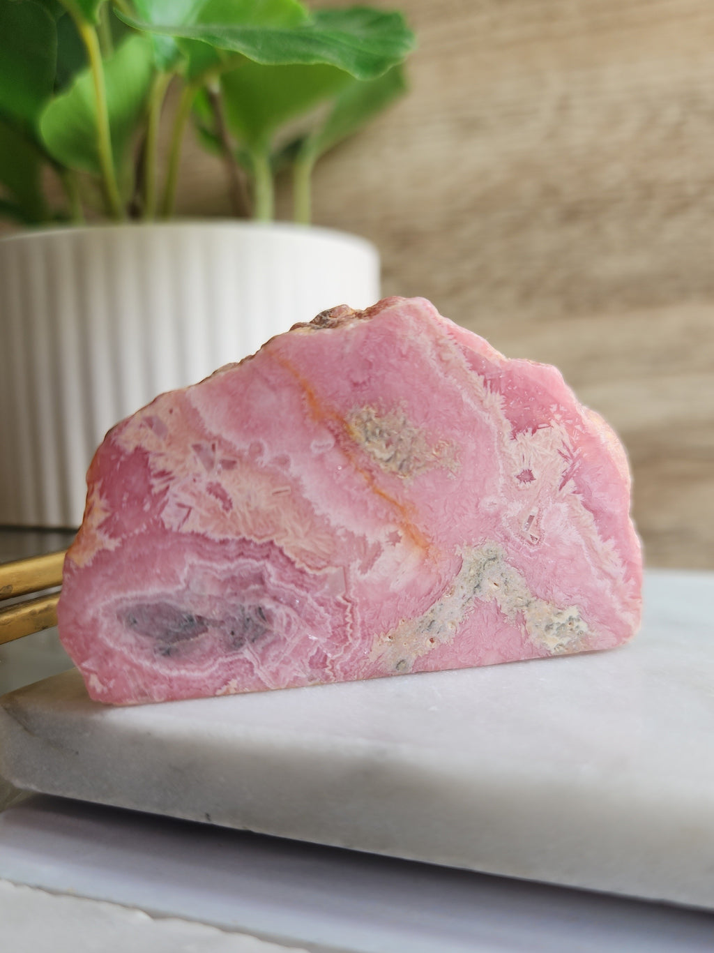 Unlock inner peace and self-acceptance with Rhodochrosite, the crystal of love and spiritual transformation