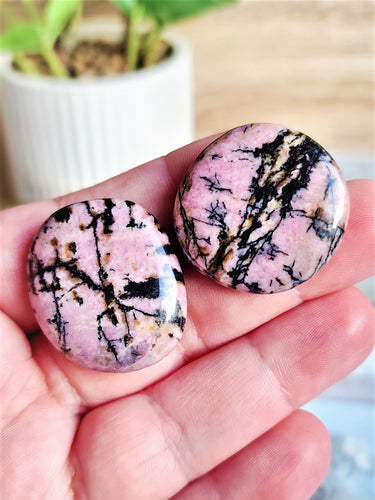 Rhodonite promotes compassion, forgiveness, and emotional healing. It often fosters a deep connection with oneself and others while encouraging a sense of love and understanding.