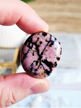 Load image into Gallery viewer, Rhodonite Palm Stone - Small
