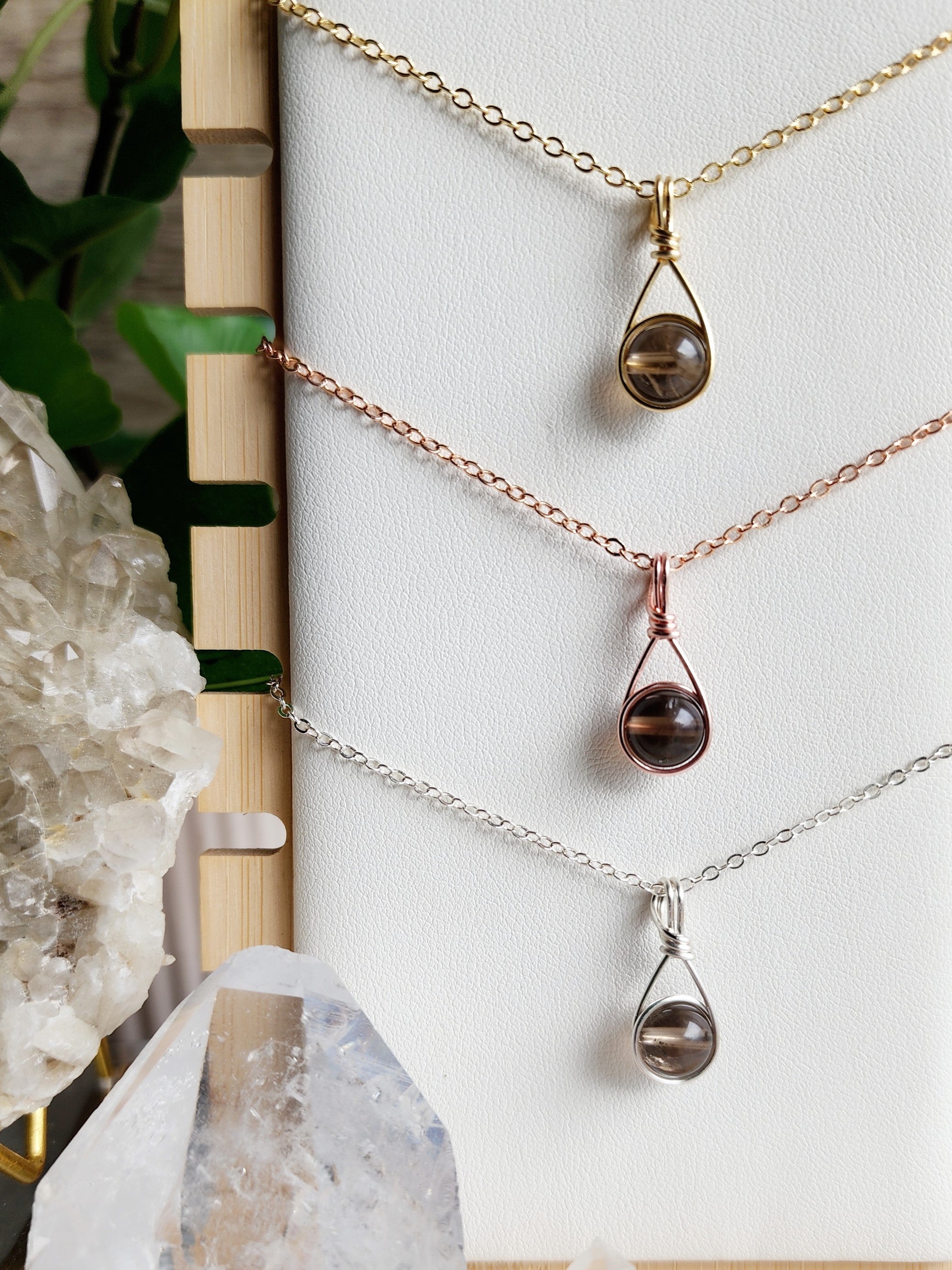 Handcrafted Delica crystal necklace by Anay Crystals, featuring a polished gemstone in a minimalist wire-wrapped setting designed for everyday wear.