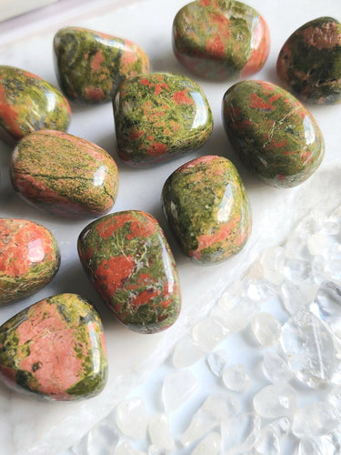 Unakite, a visually stunning blend of pink feldspar and green epidote, brings both beauty and spiritual depth. Fostering emotional balance and personal growth, it's ideal for meditation, promoting inner peace and enhancing your spiritual journey