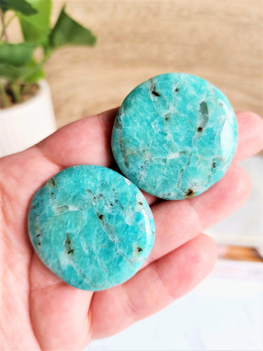 Beautiful and soothing, Amazonite is a stone of balance and love. Grown with Smokey Quartz, it brings protective properties that remove negativity, giving you a great crystal combination that promotes a safe and nurturing environment