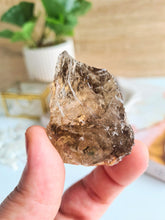 Load image into Gallery viewer, Smokey Quartz is a stone of strength that gives you the courage and confidence to work through your fears and slow down racing thoughts
